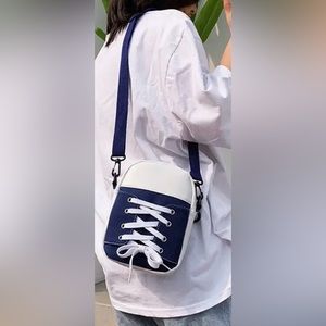 $5 SHOE PURSE. NEW. BLUE. $5 IF BUNDLED